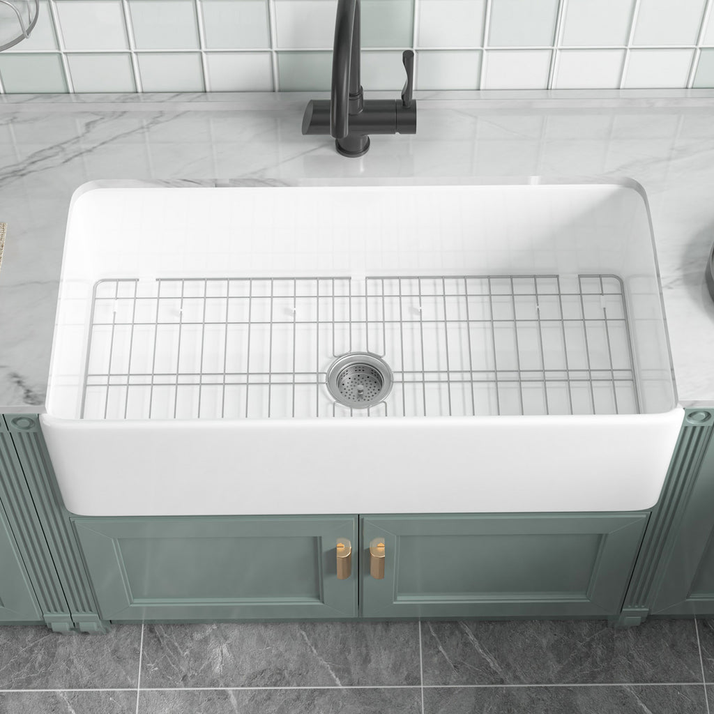 91.44cm Oversized Apron-Front Kitchen Sink   91.44cm × 45.72cm × 25.4cm double-sided apron-front single bowl, undermount installation. Made of solid fireclay in bright white, this farmhouse-style sink is durable and ideal for kitchens.