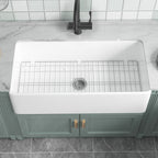 91.44cm Oversized Apron-Front Kitchen Sink   91.44cm × 45.72cm × 25.4cm double-sided apron-front single bowl, undermount installation. Made of solid fireclay in bright white, this farmhouse-style sink is durable and ideal for kitchens.